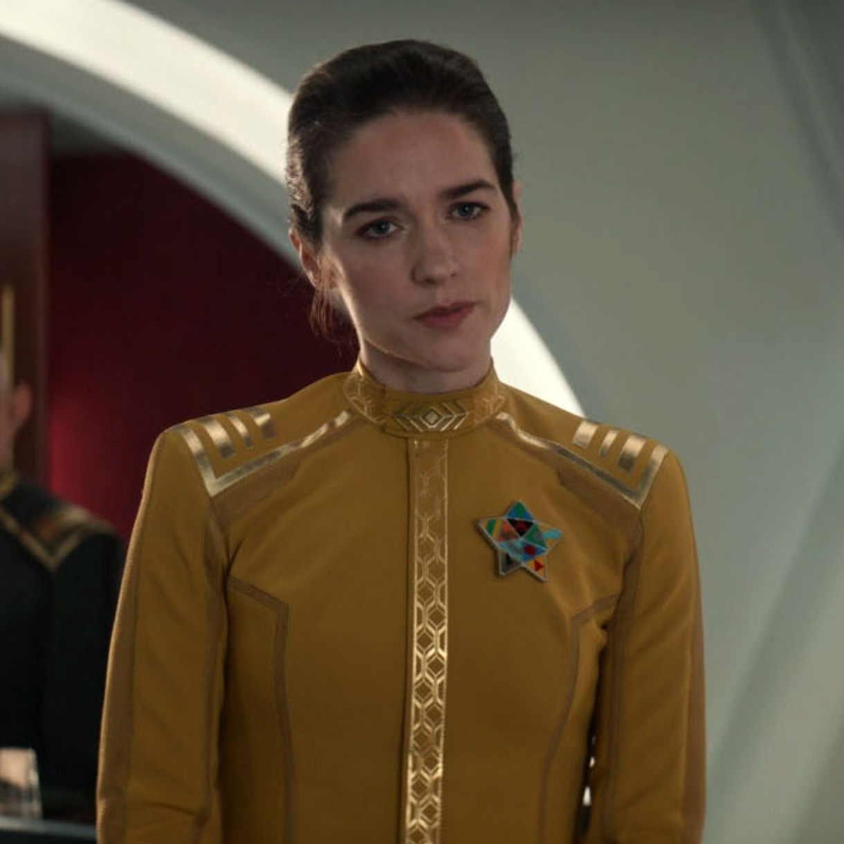 Crew wearing triangular awards